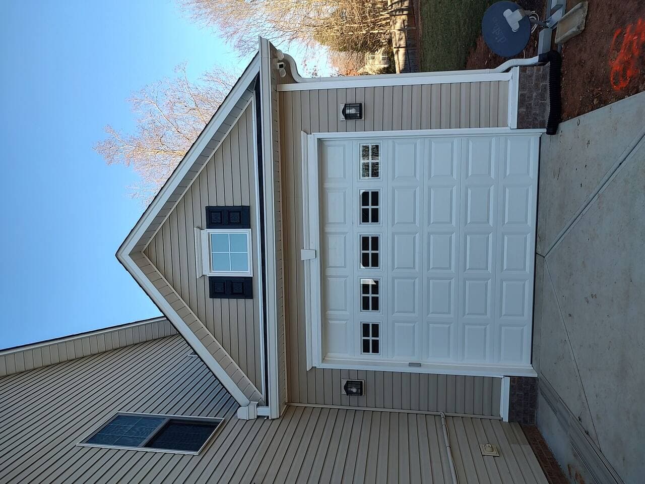 Renovated garage corner with custom cabinetry and task lighting