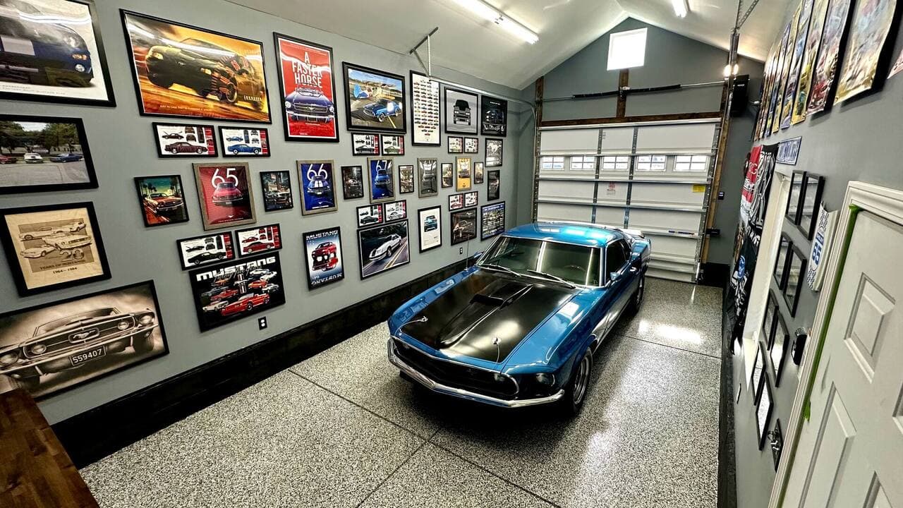 Renovated garage interior with bright lighting and custom cabinetry