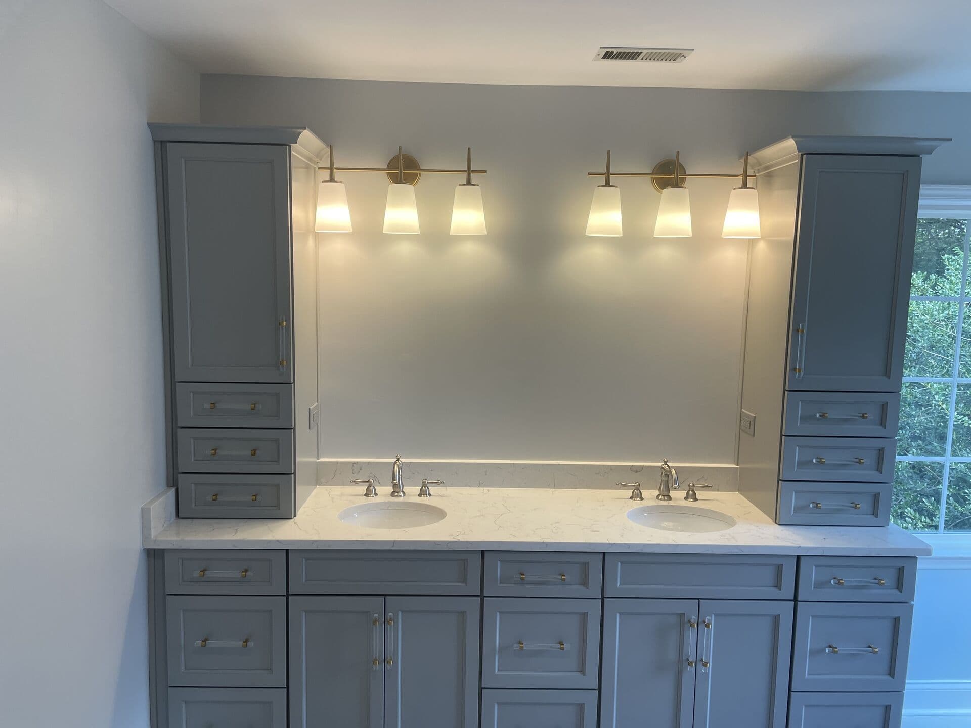 Completed bathroom renovation with modern design elements