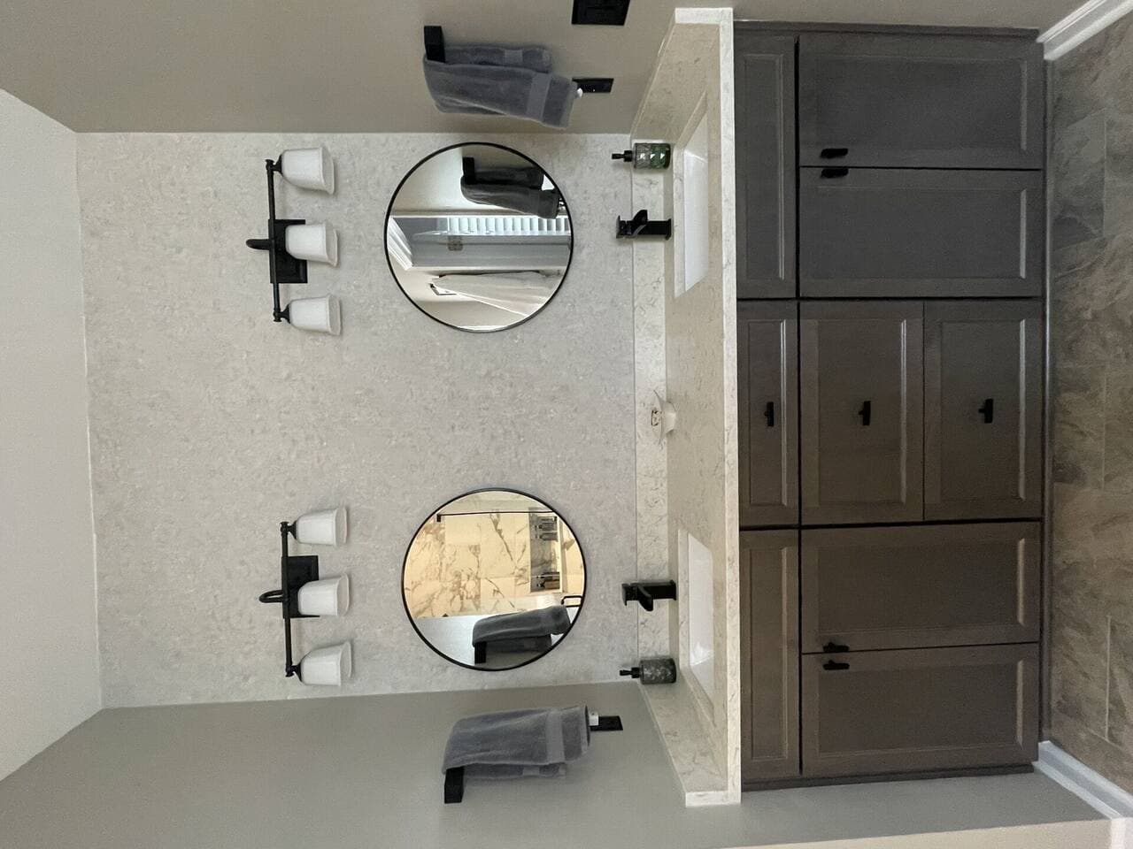 Bathroom renovation showcasing new tile work and updated amenities