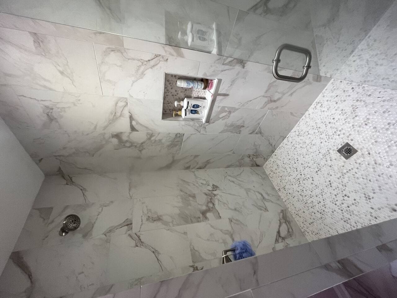 Bathroom renovation project X featuring completed renovation work