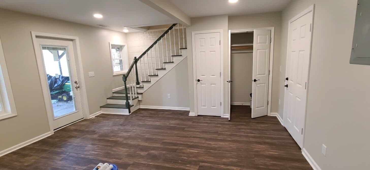 Completed basement renovation with modern finishes